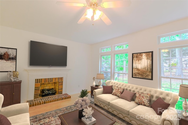 12314 Chickasaw Dr, Huntersville, NC 28078 - living area featuring ceiling fan, wood finished floors, and a fireplace