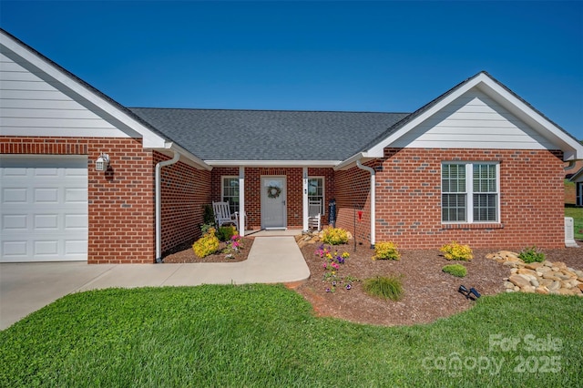 105 Kingston Pl, Spindale, NC 28160 - view of front of house featuring brick siding, a front yard, roof with shingles, and a garage