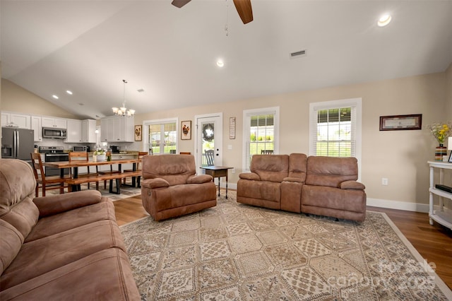 105 Kingston Pl, Spindale, NC 28160 - living room with lofted ceiling, ceiling fan, light wood-style floors, a chandelier, and baseboards