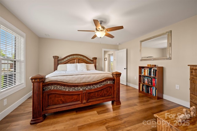 105 Kingston Pl, Spindale, NC 28160 - bedroom featuring baseboards, wood finished floors, and ceiling fan