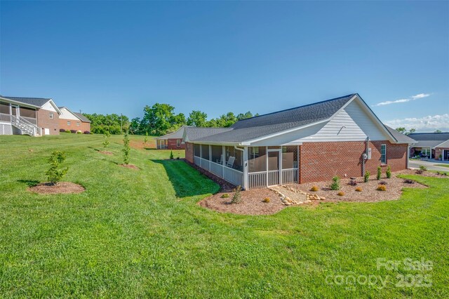 105 Kingston Pl, Spindale, NC 28160 - view of green lawn featuring a sunroom