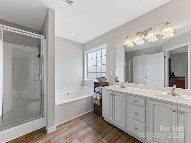 85 Lumber River Rd, Fletcher, NC 28732 - full bath with a shower stall, double vanity, wood finished floors, and a bath