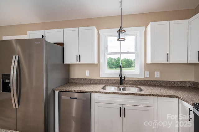 355 Northbrook Iii School Rd Unit 10, Vale, NC 28164 - kitchen featuring stainless steel appliances, a sink, dark countertops, and white cabinetry