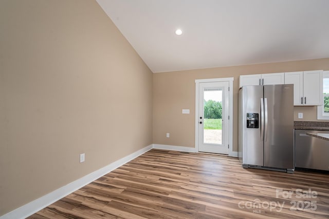 355 Northbrook Iii School Rd Unit 10, Vale, NC 28164 - kitchen featuring appliances with stainless steel finishes, wood finished floors, plenty of natural light, lofted ceiling, and recessed lighting