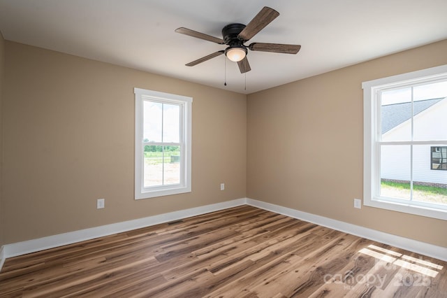 355 Northbrook Iii School Rd Unit 10, Vale, NC 28164 - spare room featuring wood finished floors, healthy amount of natural light, and baseboards