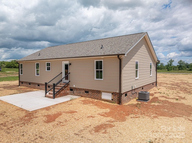 355 Northbrook Iii School Rd Unit 10, Vale, NC 28164 - rear view of house featuring crawl space, central air condition unit, roof with shingles, and a patio