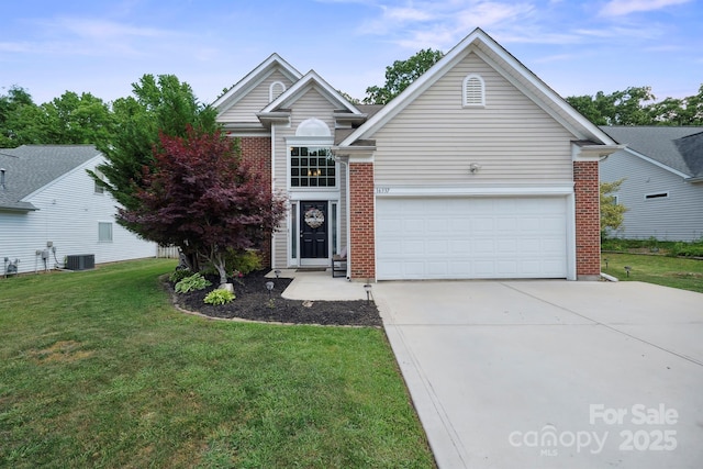 16337 Greybriar Forest Ln, Charlotte, NC 28278 - traditional home featuring brick siding, a front yard, concrete driveway, and an attached garage