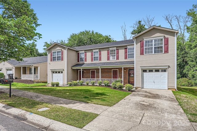 6335 Ziegler Ln, Charlotte, NC 28269 - view of front of home with a porch, an attached garage, and driveway