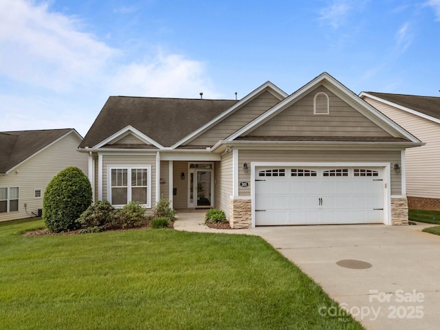301 Garner Dr, Salisbury, NC 28146 - view of front of property featuring concrete driveway, a garage, stone siding, a front lawn, and roof with shingles