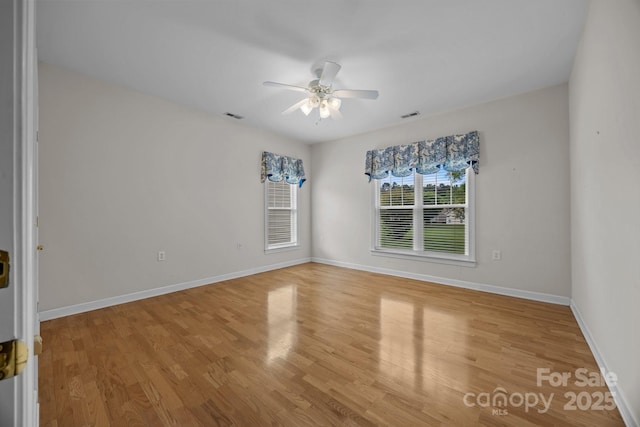 301 Garner Dr, Salisbury, NC 28146 - empty room with a ceiling fan, light wood-style flooring, and baseboards