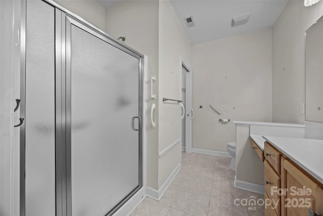301 Garner Dr, Salisbury, NC 28146 - full bath featuring vanity, a shower stall, tile patterned floors, toilet, and baseboards