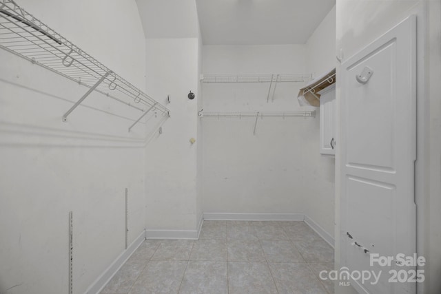 301 Garner Dr, Salisbury, NC 28146 - spacious closet with light tile patterned floors