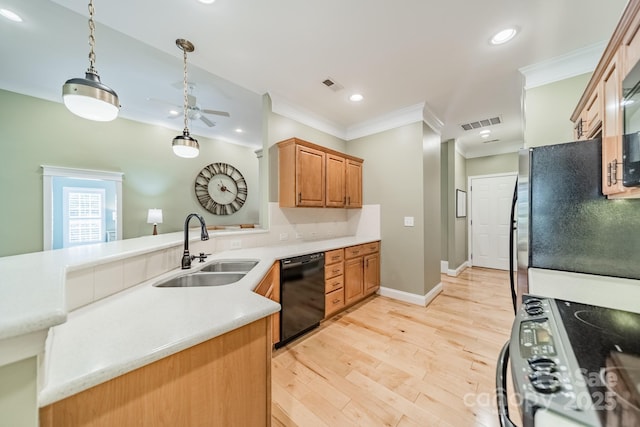 12039 Lawings Corner Dr, Huntersville, NC 28078 - kitchen with a sink, range with electric stovetop, black dishwasher, ornamental molding, and recessed lighting
