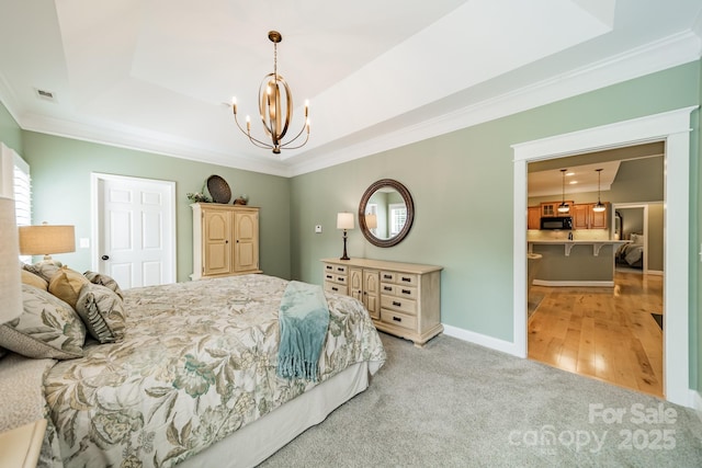 12039 Lawings Corner Dr, Huntersville, NC 28078 - bedroom featuring a raised ceiling, a chandelier, crown molding, light colored carpet, and baseboards
