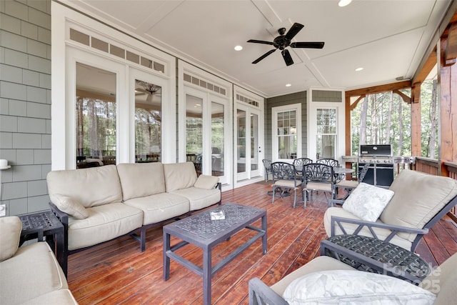18311 Rosapenny Rd, Charlotte, NC 28278 - sunroom / solarium featuring french doors, a ceiling fan, an outdoor living space, hardwood / wood-style flooring, and outdoor dining space