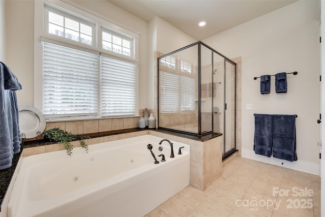18311 Rosapenny Rd, Charlotte, NC 28278 - full bathroom with a jetted tub, a shower stall, tile patterned flooring, and recessed lighting