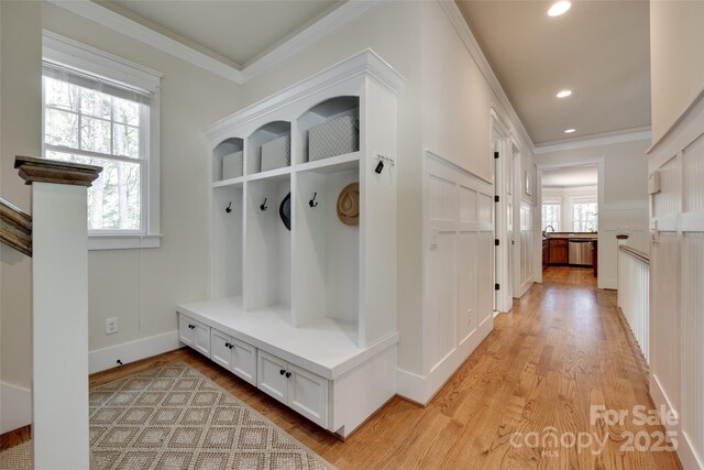18311 Rosapenny Rd, Charlotte, NC 28278 - mudroom featuring crown molding, light wood finished floors, recessed lighting, and baseboards