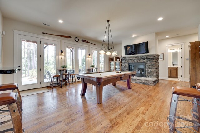 18311 Rosapenny Rd, Charlotte, NC 28278 - recreation room featuring a fireplace, pool table, light wood-type flooring, and recessed lighting