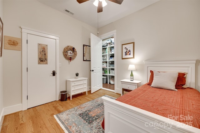 18311 Rosapenny Rd, Charlotte, NC 28278 - bedroom featuring light wood-style floors, a ceiling fan, and baseboards