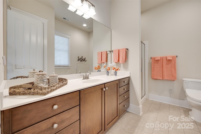 18311 Rosapenny Rd, Charlotte, NC 28278 - full bath featuring toilet, vanity, a stall shower, baseboards, and tile patterned flooring