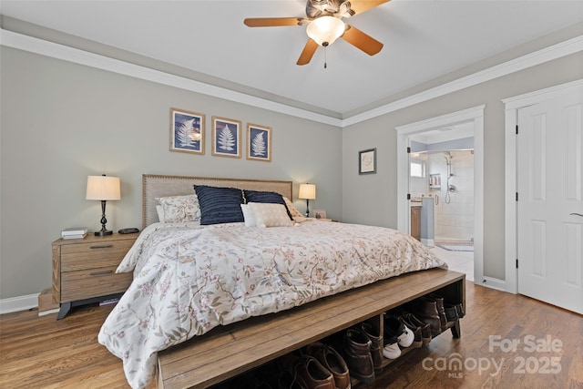 230 Fairway Falls Rd, Mills River, NC 28759 - bedroom featuring crown molding, wood finished floors, baseboards, ceiling fan, and ensuite bath