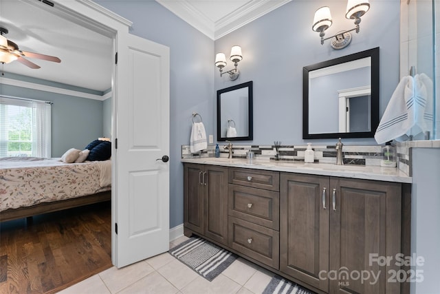 230 Fairway Falls Rd, Mills River, NC 28759 - full bathroom featuring double vanity, ornamental molding, ensuite bath, a ceiling fan, and tile patterned flooring