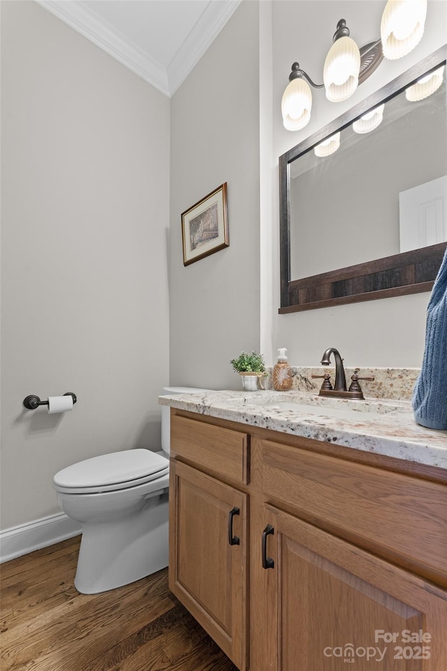 230 Fairway Falls Rd, Mills River, NC 28759 - bathroom with crown molding, vanity, toilet, wood finished floors, and baseboards