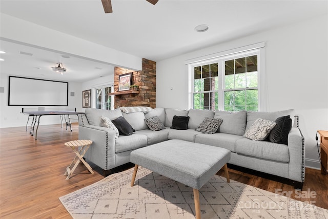 230 Fairway Falls Rd, Mills River, NC 28759 - living area with healthy amount of natural light, wood finished floors, and a ceiling fan