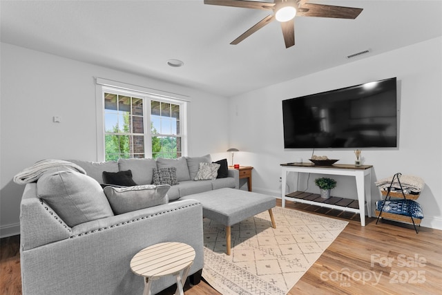 230 Fairway Falls Rd, Mills River, NC 28759 - living room featuring ceiling fan, wood finished floors, and baseboards