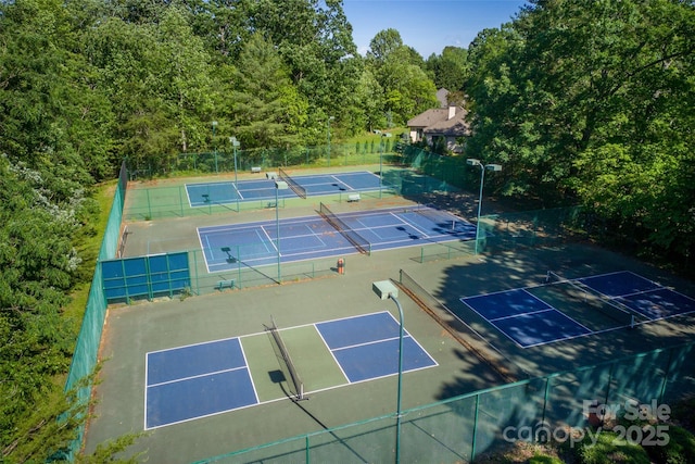 230 Fairway Falls Rd, Mills River, NC 28759 - view of tennis court with a forest view