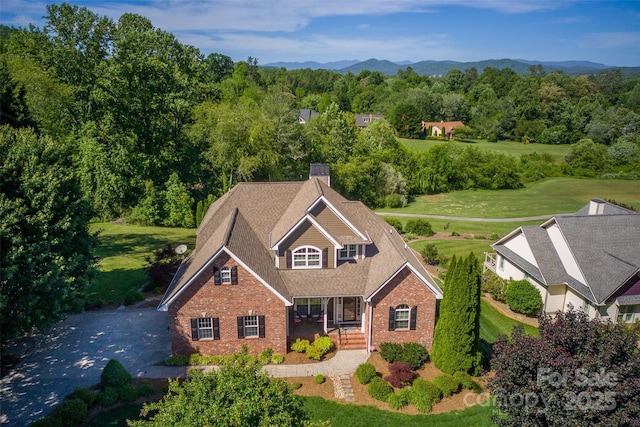 230 Fairway Falls Rd, Mills River, NC 28759 - view of front facade with brick siding, a porch, and a mountain view