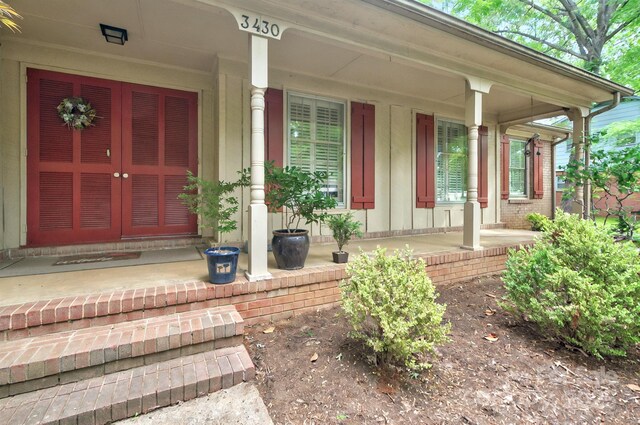 3430 Rea Rd, Charlotte, NC 28226 - entrance to property with a porch