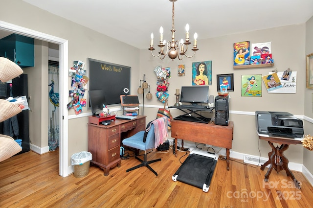 3430 Rea Rd, Charlotte, NC 28226 - office area with wood finished floors, a chandelier, and baseboards