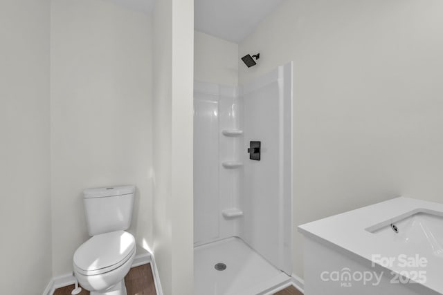 276 Bob Mcneill Rd, West Jefferson, NC 28694 - full bath with a shower, toilet, baseboards, and wood finished floors