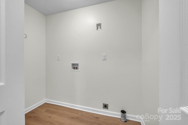 276 Bob Mcneill Rd, West Jefferson, NC 28694 - washroom featuring washer hookup, wood finished floors, hookup for an electric dryer, and baseboards
