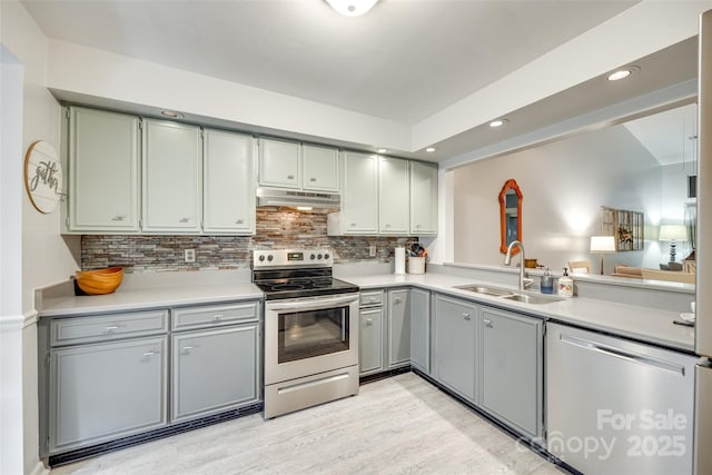 115 Pine Grove Cir, Clover, SC 29710 - kitchen featuring appliances with stainless steel finishes, a sink, under cabinet range hood, gray cabinets, and recessed lighting