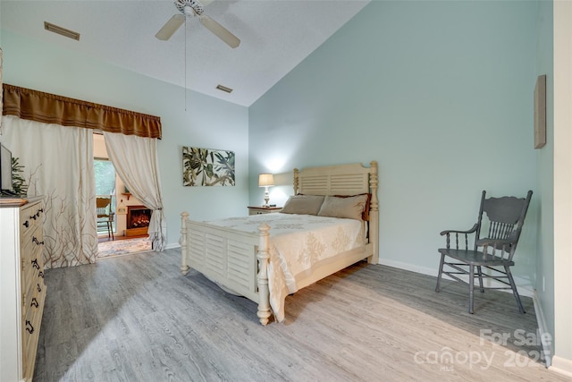 115 Pine Grove Cir, Clover, SC 29710 - bedroom featuring wood finished floors, baseboards, high vaulted ceiling, and a ceiling fan