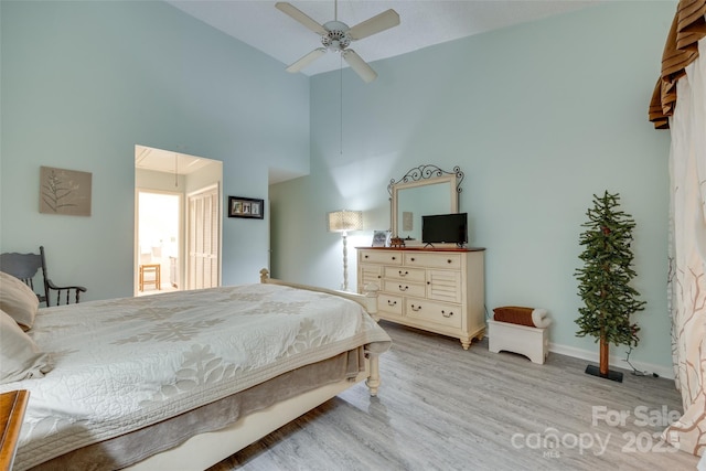 115 Pine Grove Cir, Clover, SC 29710 - bedroom with high vaulted ceiling, wood finished floors, baseboards, and ceiling fan