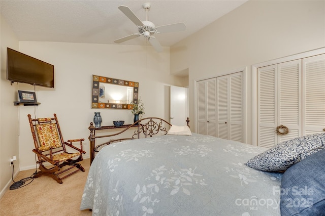 115 Pine Grove Cir, Clover, SC 29710 - carpeted bedroom featuring lofted ceiling, multiple closets, a ceiling fan, and baseboards