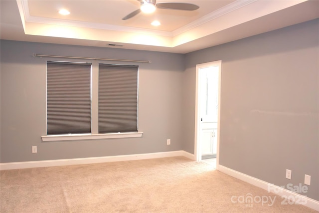745 Garrett Green Way, Fort Mill, SC 29715 - spare room featuring a tray ceiling, crown molding, carpet floors, ceiling fan, and recessed lighting