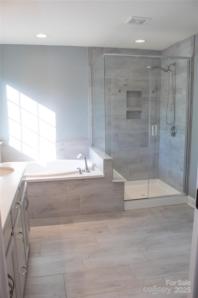 745 Garrett Green Way, Fort Mill, SC 29715 - full bath with a shower stall, vanity, a garden tub, recessed lighting, and tile patterned floors