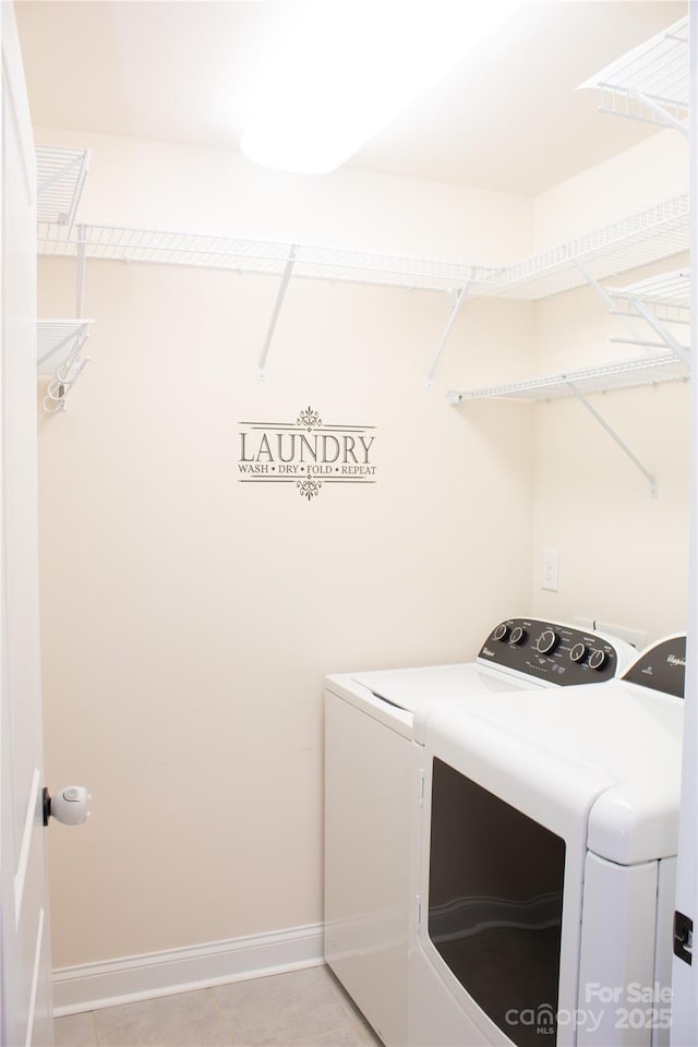 745 Garrett Green Way, Fort Mill, SC 29715 - laundry area featuring independent washer and dryer, light tile patterned flooring, and baseboards