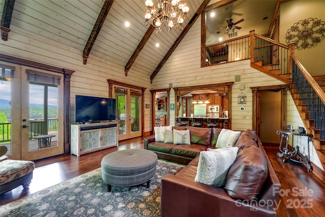 414 Trails End Rd, Bryson City, NC 28713 - living area with french doors, high vaulted ceiling, wood finished floors, wood walls, and a chandelier