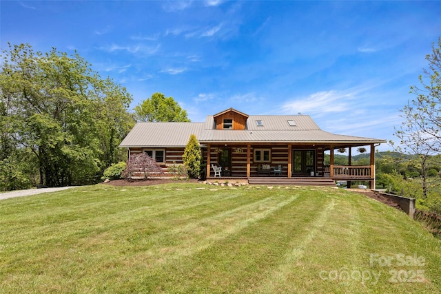 225 Ford Rd, Waynesville, NC 28786 - rear view of property featuring a lawn, log siding, and metal roof