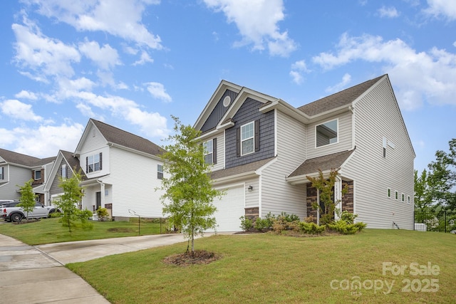 18026 Stark Way, Charlotte, NC 28278 - view of front of house with driveway, a garage, a front yard, and a shingled roof