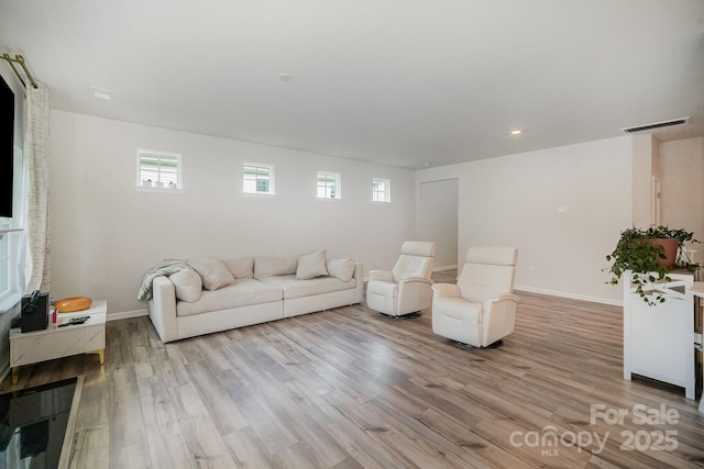 18026 Stark Way, Charlotte, NC 28278 - living area with light wood finished floors, baseboards, and recessed lighting