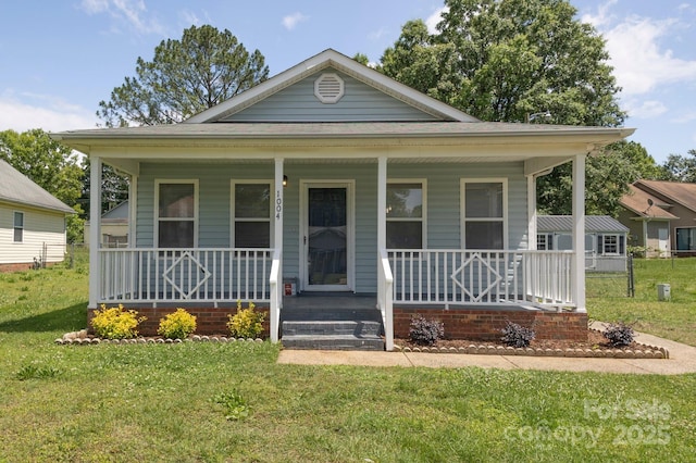 1004 Johnson St, Charlotte, NC 28206 - view of front of house featuring a porch and a front lawn