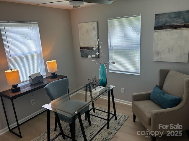 1004 Johnson St, Charlotte, NC 28206 - home office featuring wood finished floors, ceiling fan, and baseboards