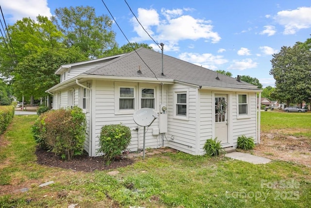 1000 Oakshade Ave, Kannapolis, NC 28083 - rear view of property featuring a lawn