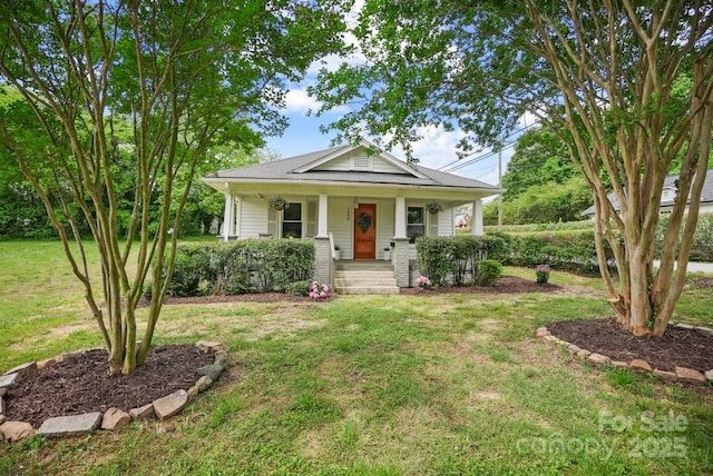 1000 Oakshade Ave, Kannapolis, NC 28083 - view of front of property featuring a porch and a front lawn